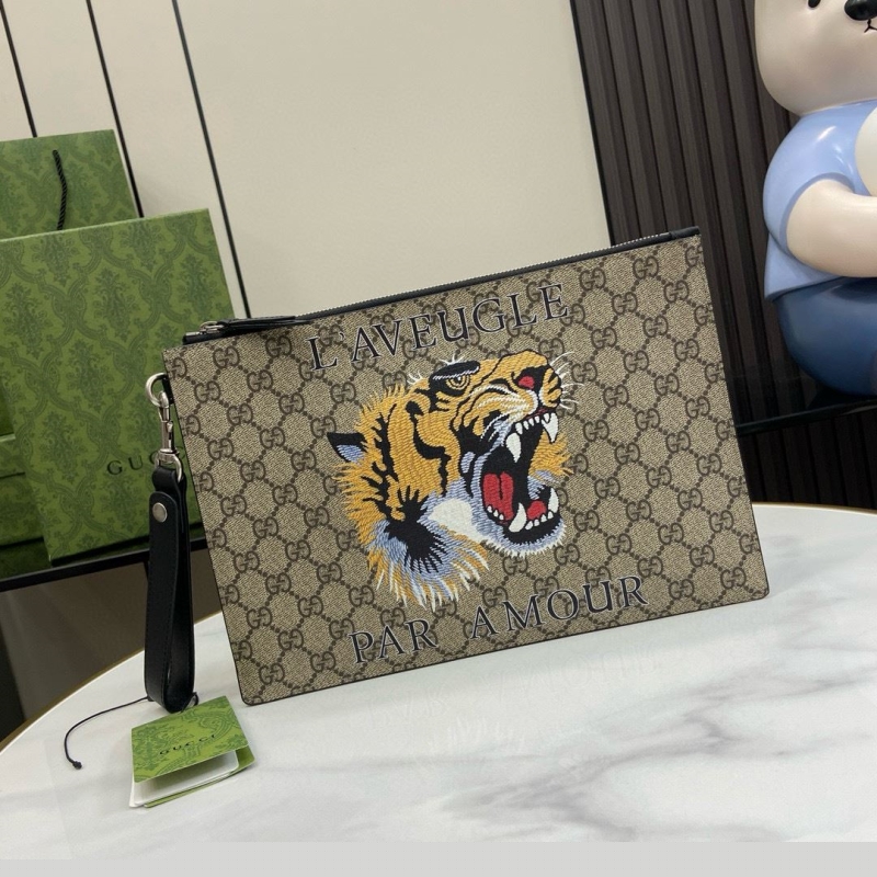 G*u*i clutch bags